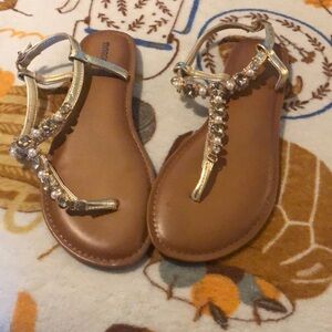 Gold bejeweled sandals